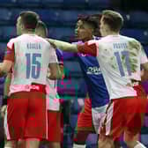 Rangers' Glen Kamara (left) argues with Slavia Prague's Ondrej Kudela.