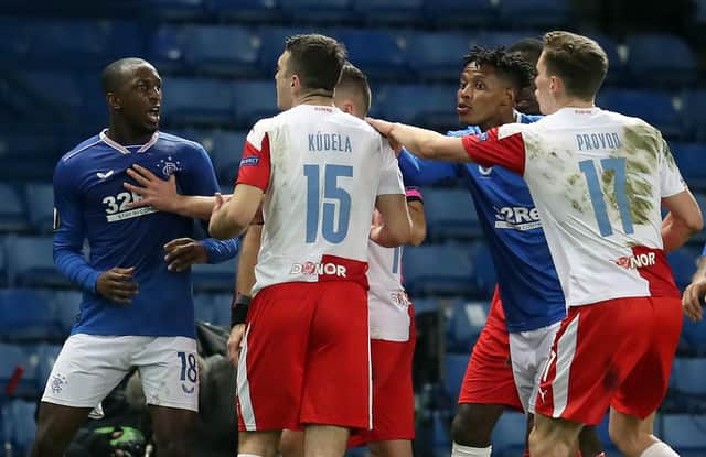 Rangers' Glen Kamara (left) argues with Slavia Prague's Ondrej Kudela.