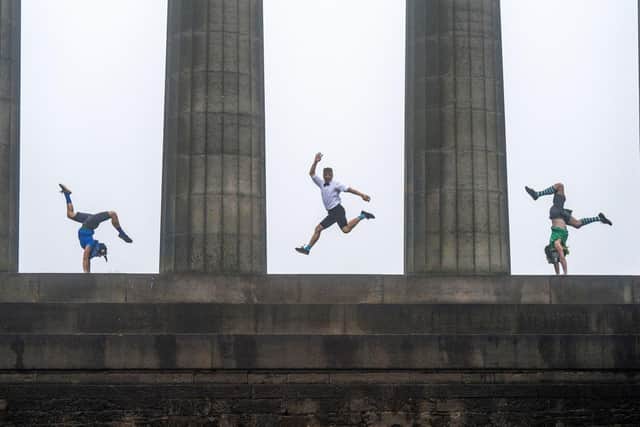 Lisa Whitmore, Toffy Paulweber and Jared Shanks from circus company Brainfools during a photocall on Calton Hill in Edinburgh, ahead of their performances of Lucky Pigeons throughout the Edinburgh Festival Fringe. Picture: Jane Barlow/PA Wire
