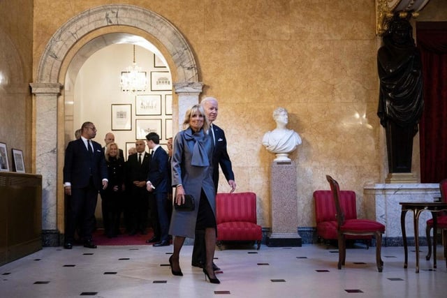 US President Joe Biden and US First Lady Jill Biden arrive to sign a book of condolence at Lancaster House in London on September 18, 2022, following the death of Queen Elizabeth II on September 8. - Britain was gearing up Sunday for the momentous state funeral of Queen Elizabeth II as King Charles III prepared to host world leaders and as mourners queued for the final 24 hours left to view her coffin, lying in state in Westminster Hall at the Palace of Westminster. (Photo by Brendan Smialowski / AFP) (Photo by BRENDAN SMIALOWSKI/AFP via Getty Images)