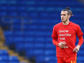 Gareth Bale warms up for the Wales v Czech Republic match in a Show Racism the Red Card t-shirt