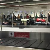 Baggage piling up at Edinburgh Airport on Wednesday. Picture: Karen McAvoy