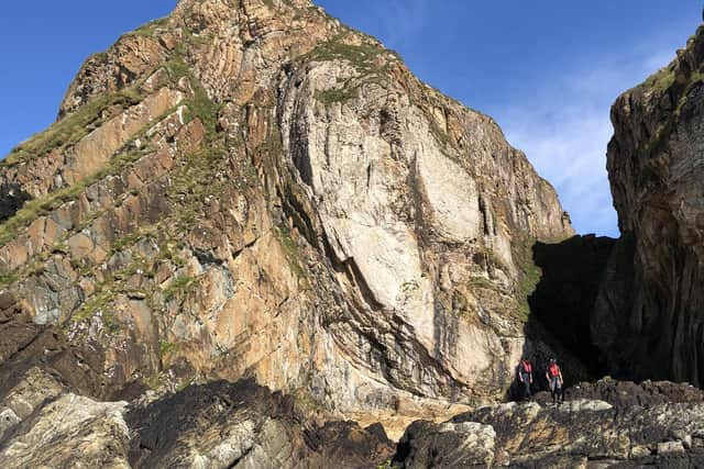 An outcrop called 'the Bubble' on Eileach an Naoimh (Holy Isle) which shows a huge white rock fragment, tens of metres across, which was originally part of the underlying rock sequence. Photo: Graham Shields/UCL/PA Wire