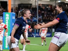 Scotland's Chloe Rollie (L) celebrates scoring a try during the win over Japan at the DAM Health Stadium (Photo by Ross Parker / SNS Group)