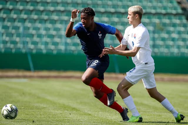 Brandon Soppy in action for France U17s against Slovakia's Filip Szetei