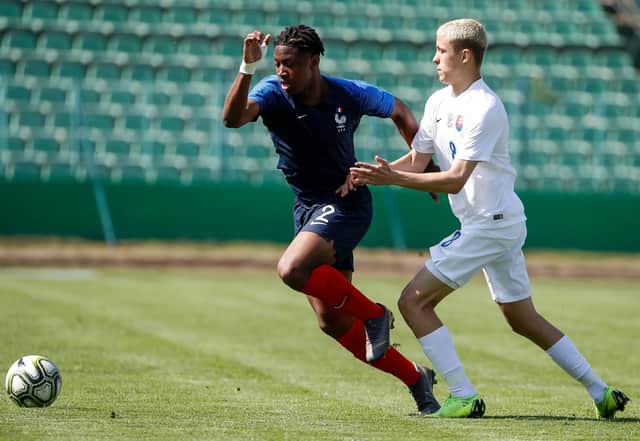 Brandon Soppy in action for France U17s against Slovakia's Filip Szetei