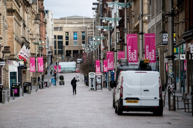 An almost empty Buchanan Street in the centre of Glasgow as people observe the spring 2020 lockdown. Non-essential stores were closed again more recently under tighter restrictions, hammering trade. Picture: John Devlin