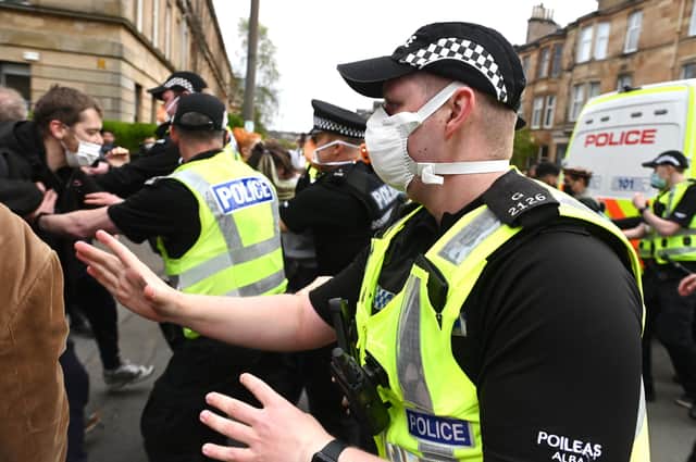 Dozens of activists arrived on the street, and police have already removed a number of protesters.