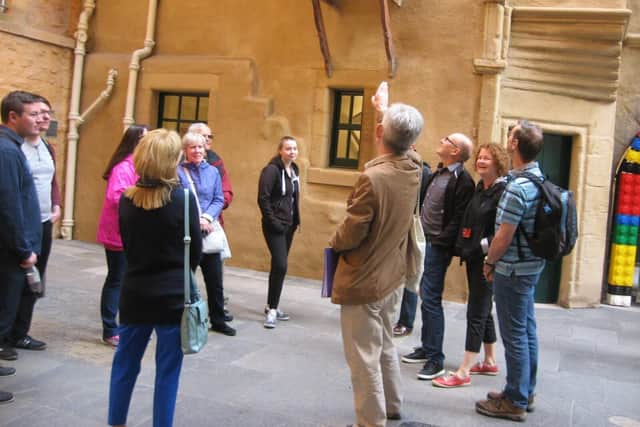 A group listening to Jim