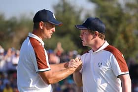 Justin Rose and Robert MacIntyre celebrate during the Saturday afternoon fourball matches in the Ryder Cup at Marco Simone Golf Club in Rome. Picture: Ross Kinnaird/Getty Images.