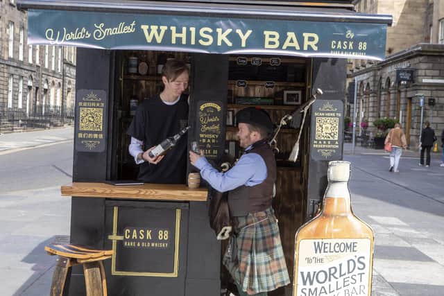 The world's smallest whisky bar has opened in an old police box in Edinburgh's Princes Street
Pic: Katielee Arrowsmith /SWNS