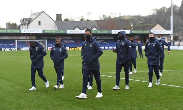 Rangers players on the pitch ahead of kick off during the Scottish Premiership match between Ross County and Rangers at the Global Energy Stadium on December 06, 2020, in Dingwall, Scotland. (Photo by Craig Foy / SNS Group)
