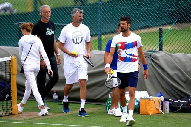 Defending champion Novak Djokovic opens play on Centre Court.