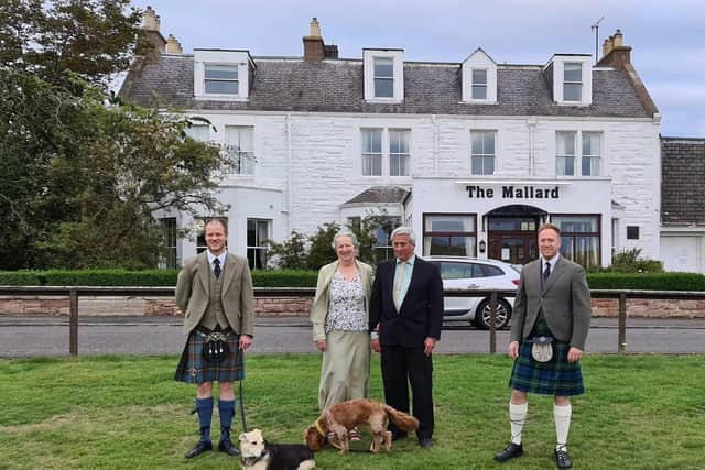 Susan Law and her husband Cameron with their two sons Gavin and Ewan and two dogs Rudy and Bailey picture: Susan Law