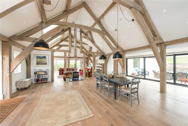 The large central dining area includes sliding doors leading to an enclosed west facing courtyard.