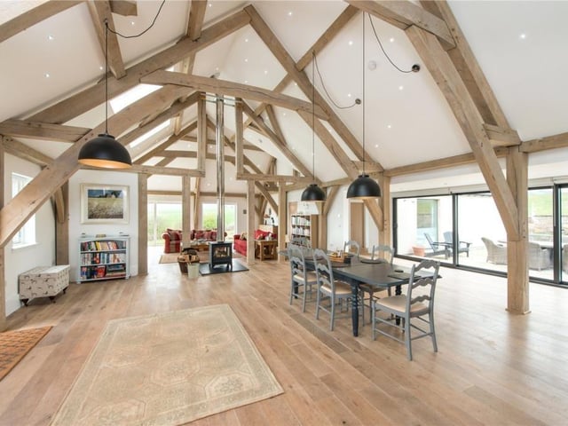 The large central dining area includes sliding doors leading to an enclosed west facing courtyard.
