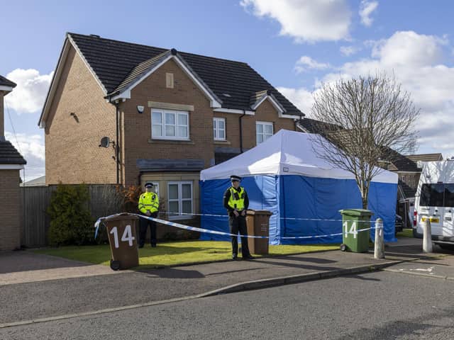 Officers from Police Scotland outside the home of former chief executive of the Scottish National Party (SNP) Peter Murrell, in Uddingston, Glasgow, after he was "released without charge pending further investigation", after he was arrested on Wednesday as part of a probe into the party's finances. Picture date: Thursday April 6, 2023.