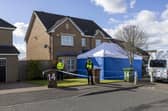 Officers from Police Scotland outside the home of former chief executive of the Scottish National Party (SNP) Peter Murrell, in Uddingston, Glasgow, after he was "released without charge pending further investigation", after he was arrested on Wednesday as part of a probe into the party's finances. Picture date: Thursday April 6, 2023.