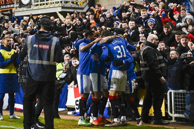 Rangers' Fashion Sakala celebrates making it 1-0 against Dundee United at Tannadice.