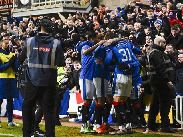 Rangers' Fashion Sakala celebrates making it 1-0 against Dundee United at Tannadice.