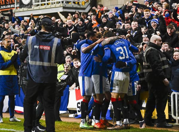 Rangers' Fashion Sakala celebrates making it 1-0 against Dundee United at Tannadice.
