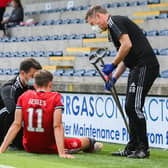 Aberdeen's Ryan Hedges left Stark's Park on crutches.