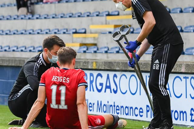 Aberdeen's Ryan Hedges left Stark's Park on crutches.