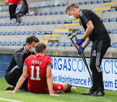 Aberdeen's Ryan Hedges left Stark's Park on crutches.