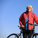 Mavis Paterson, known as Granny Mave, poses with her bike in the countryside of Dumfries and Galloway. Picture: Paul Hackett