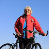 Mavis Paterson, known as Granny Mave, poses with her bike in the countryside of Dumfries and Galloway. Picture: Paul Hackett