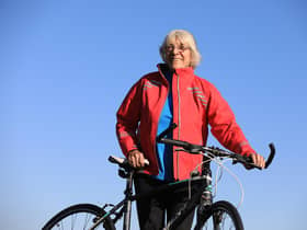 Mavis Paterson, known as Granny Mave, poses with her bike in the countryside of Dumfries and Galloway. Picture: Paul Hackett