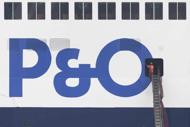 A worker stands on one of the three suspended ferries anchored at the Port of Dover. Picture: Dan Kitwood/Getty Images