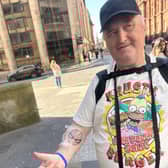 John showcasing his new Spiderman tattoo