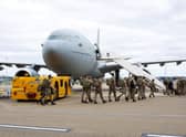 UK military personnel prior to boarding an RAF Voyager aircraft at RAF Brize Norton in Oxfordshire, as part of a 600-strong UK-force sent to assist with the operation to rescue British nationals in Afghanistan.
