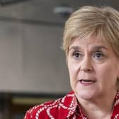 Former first minister of Scotland Nicola Sturgeon speaking to the media on her return to the Scottish Parliament