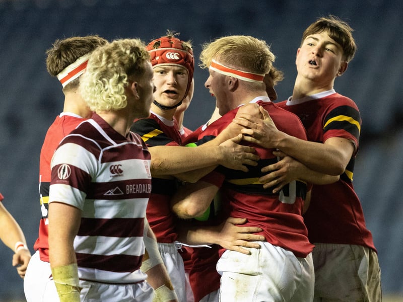 Stewart's Melville celebrate scoring a try during the Scottish Schools U-18 Cup Final against George Watson's College at Murrayfield.
