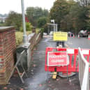The pavement closure on Switchback Road on the approach to the Canniesburn Toll roundabout in Bearsden. (Photo by The Scotsman)