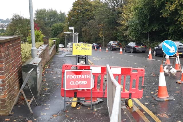 The pavement closure on Switchback Road on the approach to the Canniesburn Toll roundabout in Bearsden. (Photo by The Scotsman)