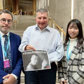 Mark Sabah and Chloe Cheung of the Committee for Freedom in Hong Kong Foundation, with MSP Jeremy Balfour at the Scottish Parliament.