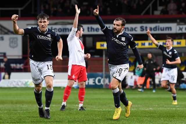 Paul McMullan celebrates after scoring for Dundee in their Scottish Cup victory over Airdrieonians.