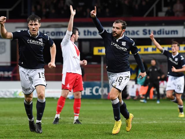 Paul McMullan celebrates after scoring for Dundee in their Scottish Cup victory over Airdrieonians.