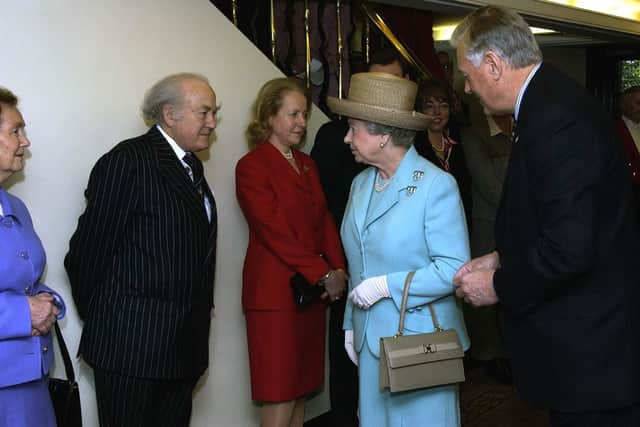 Sir Ray Tindle meeting The Queen in 2002 (Picture: PA)