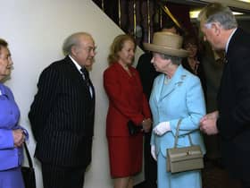 Sir Ray Tindle meeting The Queen in 2002 (Picture: PA)