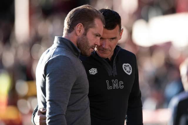 Hearts manager Robbie Neilson and his assistant Lee McCulloch discuss matters at Pittodrie.