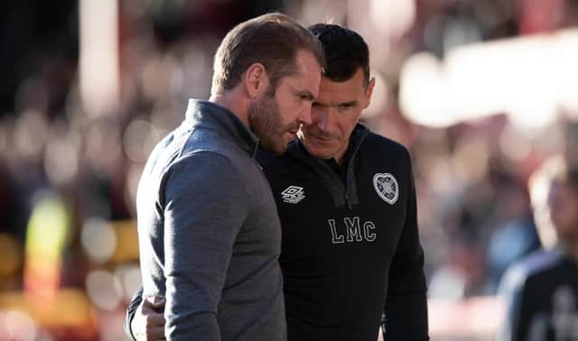 Hearts manager Robbie Neilson and his assistant Lee McCulloch discuss matters at Pittodrie.