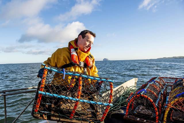 Stewart Pearson at sea catching lobsters.