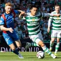 Celtic's Reo Hatate and Inverness' David Carson in action during last season's Scottish Cup final, which was moved to a 5.30pm kick-off to avoid clashing with the FA Cup final. (Photo by Mark Scates / SNS Group)