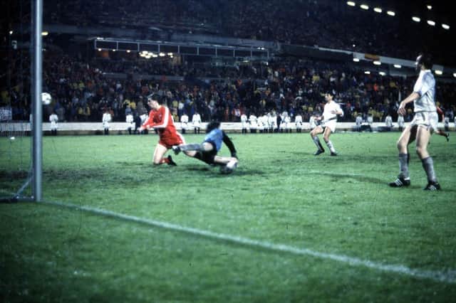 John Hewitt (left) scores Aberdeen's most important-ever goal v Real Madrid in Gothenburg to win the European Cup Winners' Cup on this day in 1983