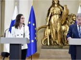 Finland's prime minister, Sanna Marin (left), and its president, Sauli Niinistö, announcing Finland would apply for Nato membership. Photograph: Heikki Saukkomaa/Lehtikuva/AFP/Getty Images