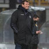 Tommy Wright at a wet Dens Park - his Kilmarnock side trail 2-1 after first leg of Premiership play-off final  (Photo by Craig Foy / SNS Group)